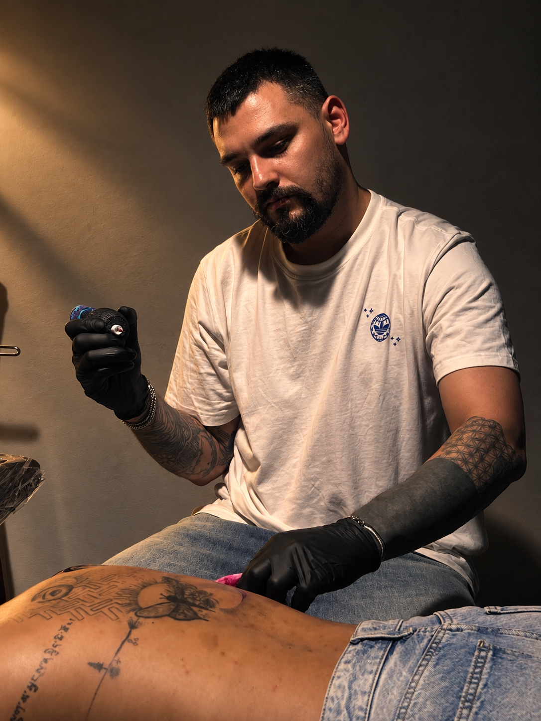 Alexandros Athanasiou working on a tattoo